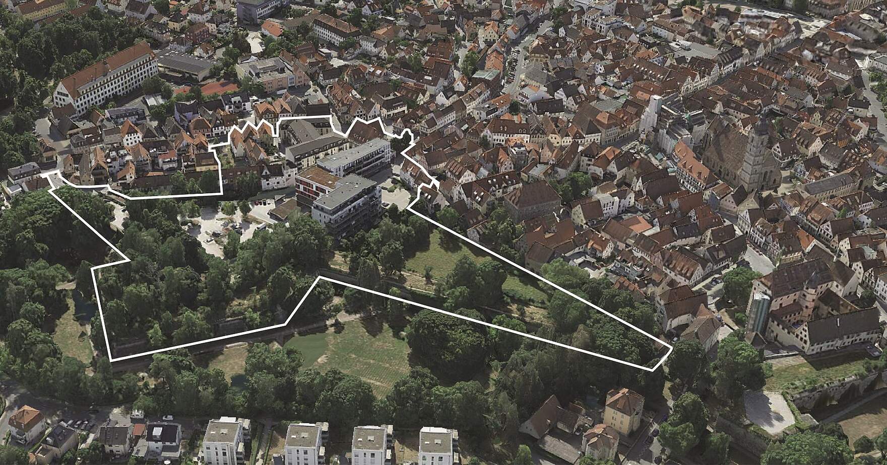 Sanierungsgebiet SAN IX - Altes Krankenhaus Eine Luftbildaufnahme eines Stadtteils mit eingezeichneten Außengrenzen eines Sanierungsgebiets.